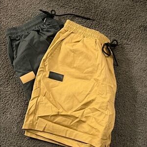 Stylish Tan and Black Men's Shorts. Two pairs.